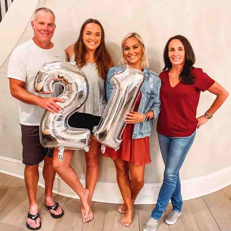 Brittany Favre with her parents and her sister at her sister's 21st birthday.